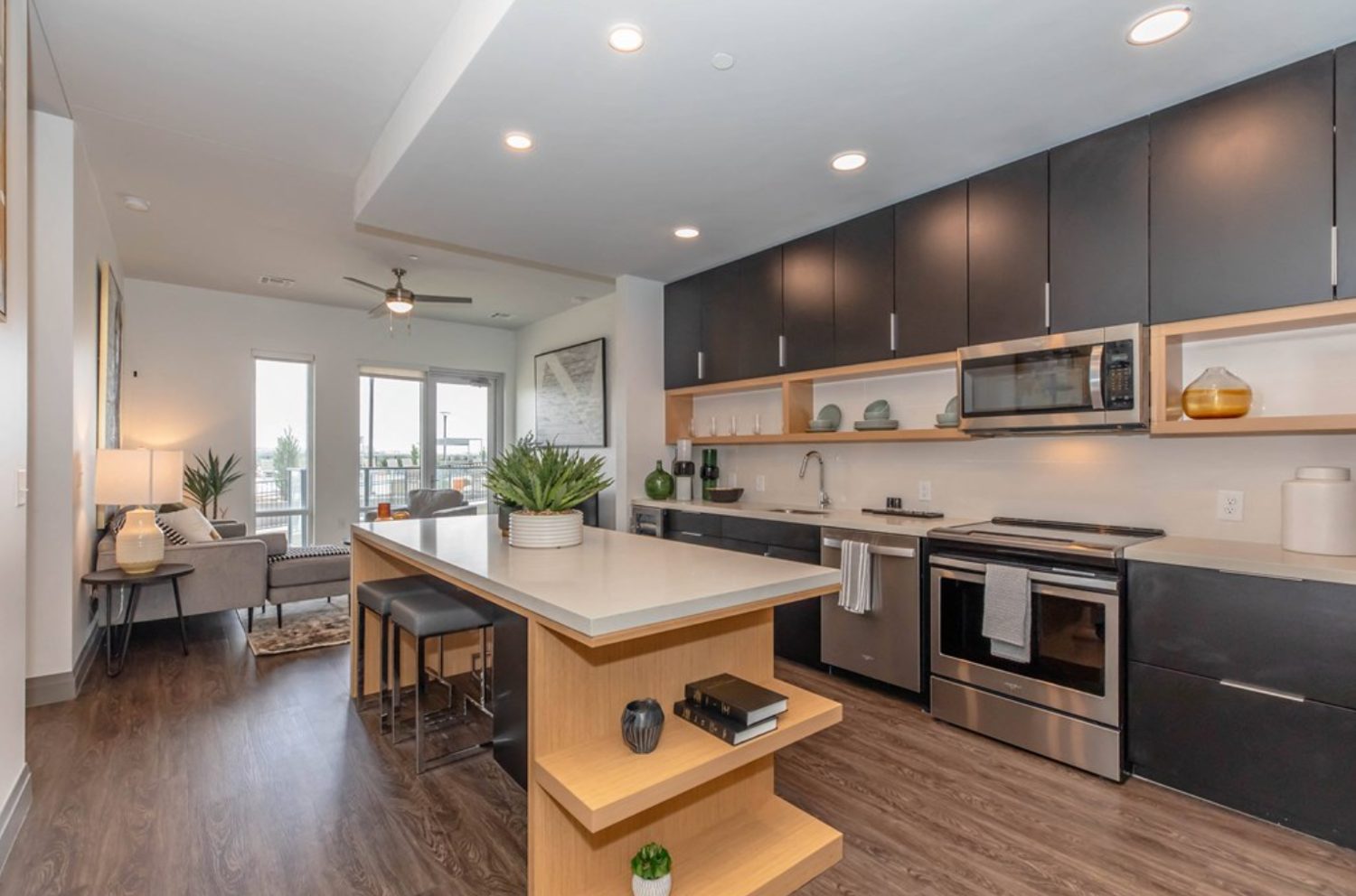 Soundstop acoustical flooring in a bright open-concept multifamily kitchen